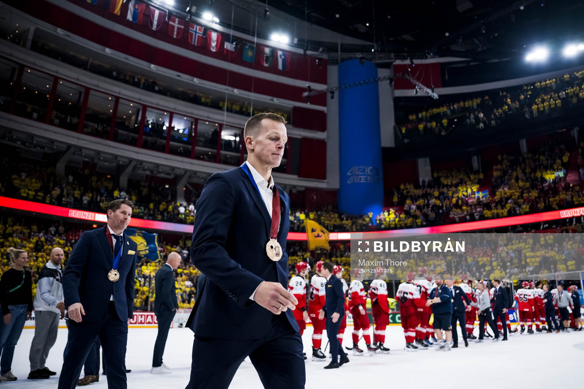 Max Friberg of Sweden with his bronze medal