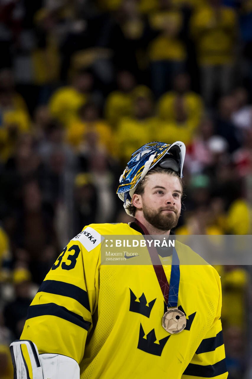 Goaltender Samuel Ersson of Sweden with his bronze medal