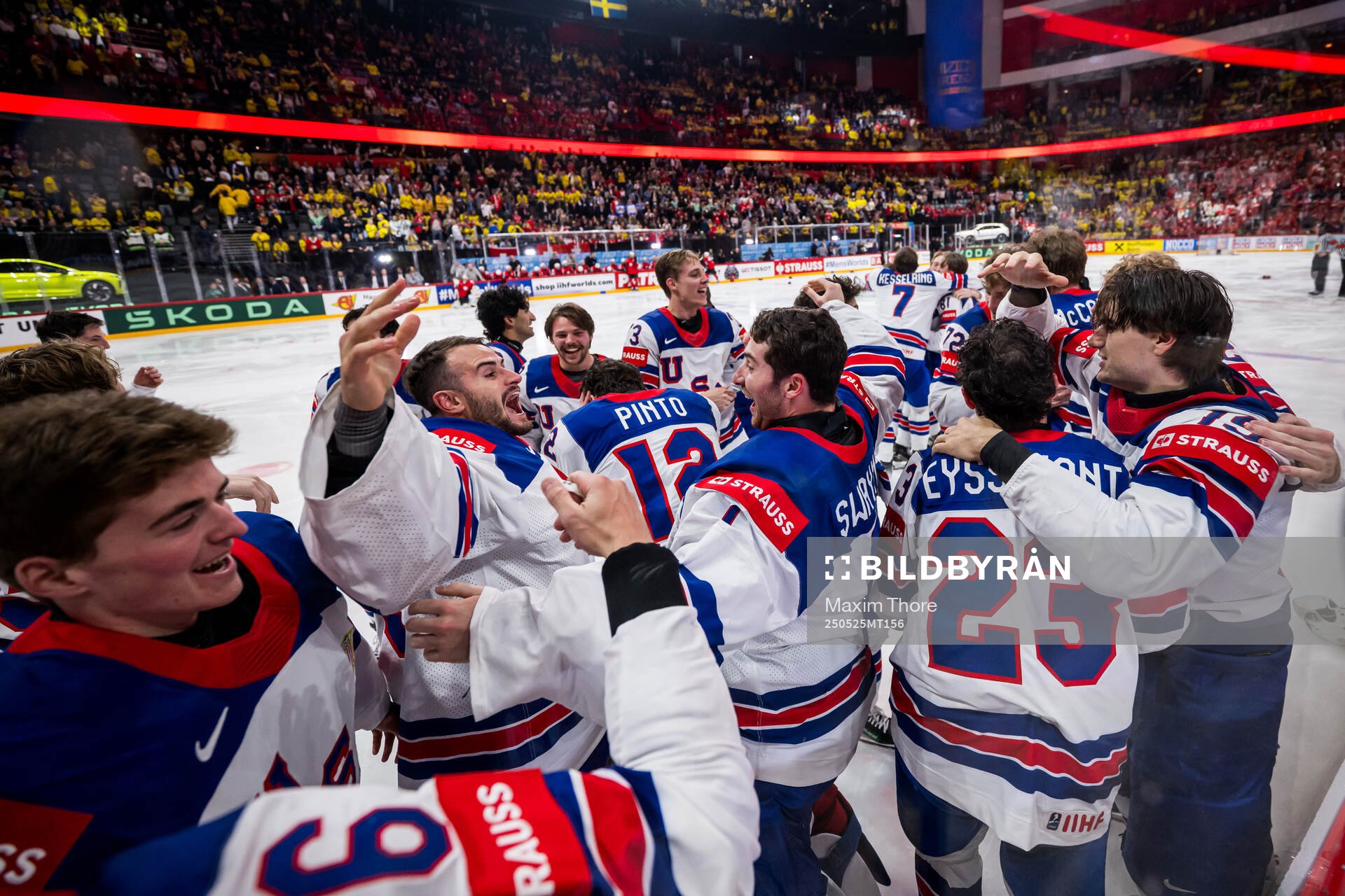 goaltender Jeremy Swayman of USA celebrates with team mates