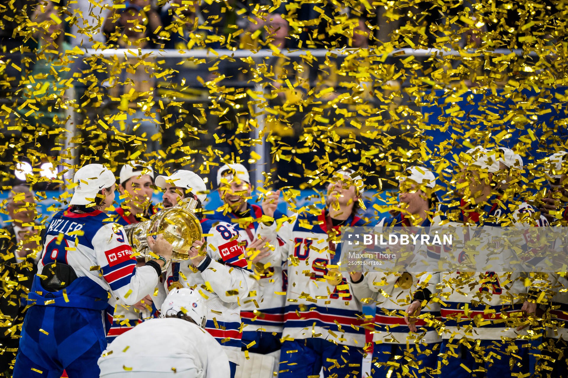 Conor Garland and Clayton Keller of USA celebrate with the