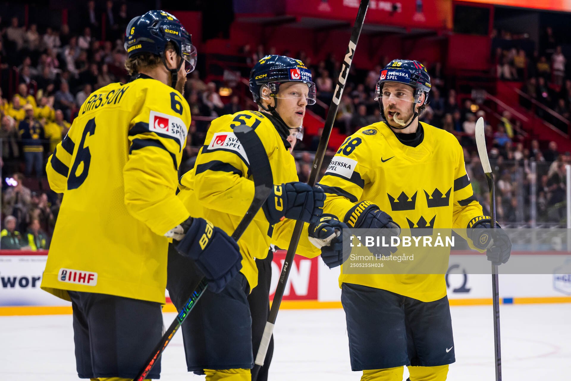 Adam Larsson, Emil Heineman and Elias Lindholm of Sweden
