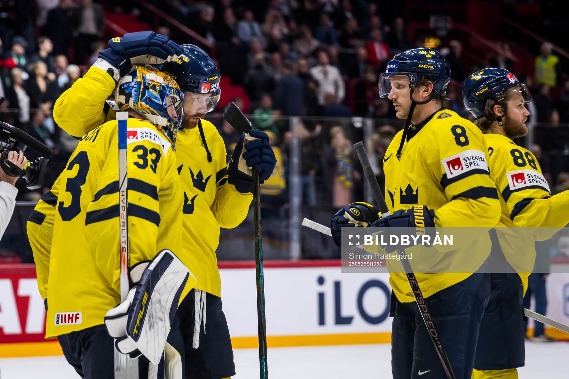 goaltender Samuel Ersson of Sweden celebrates with team