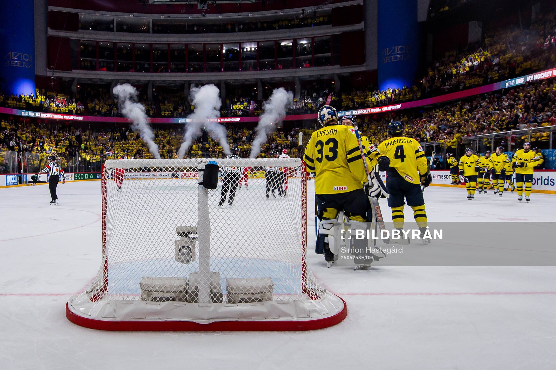 goaltender Samuel Ersson of Sweden with team mates