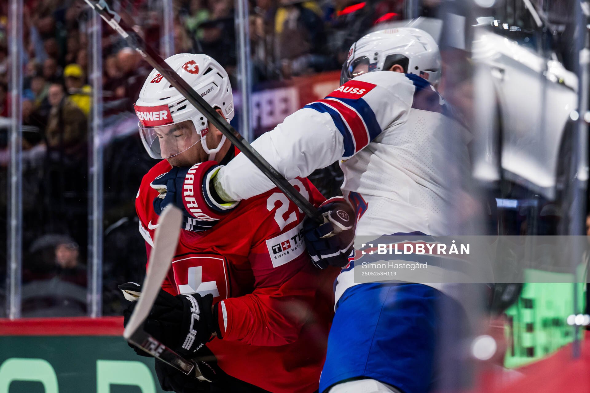 Nino Niederreiter of Switzerland and Zach Werenski of USA