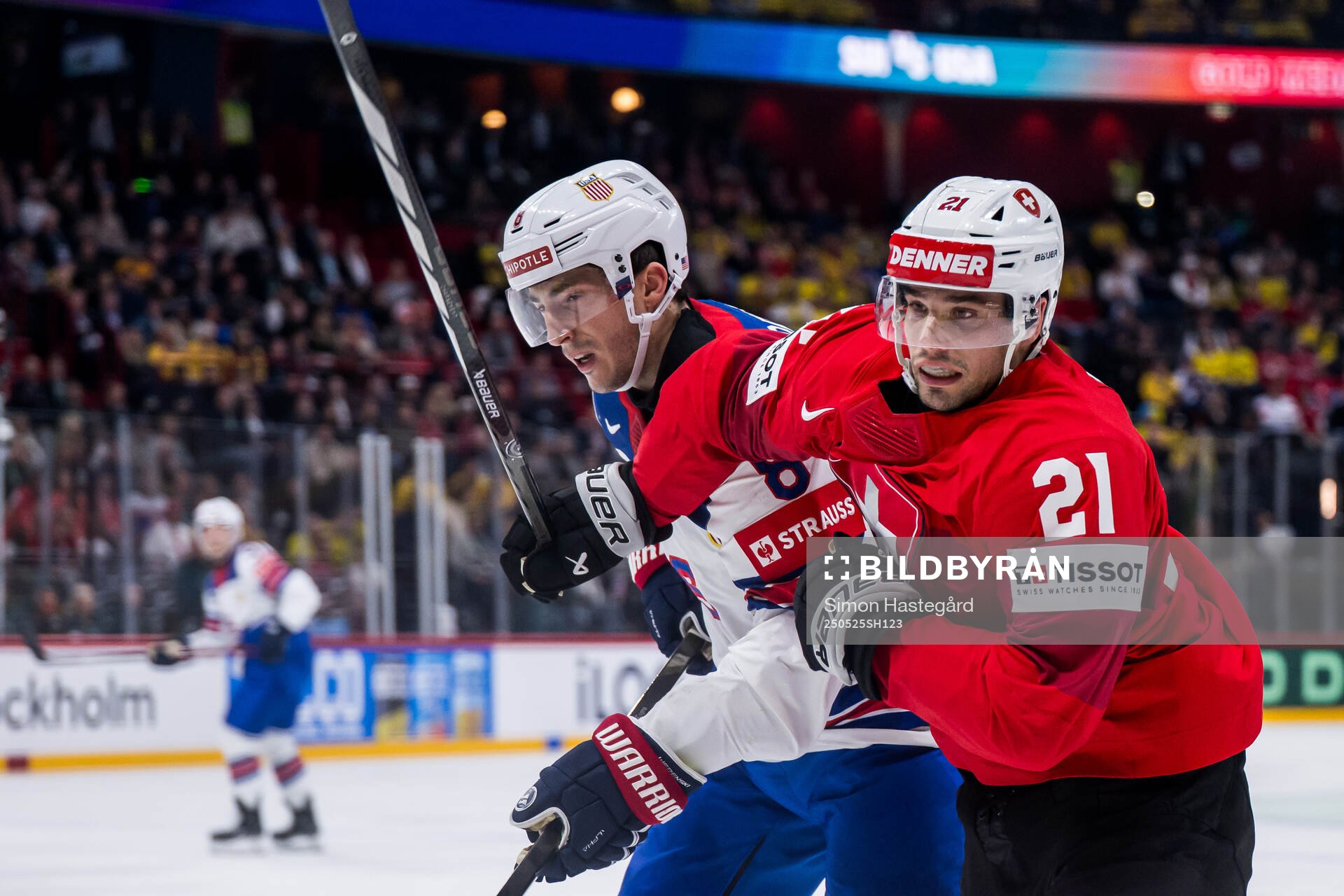 Zach Werenski of USA and Kevin Fiala of Switzerland