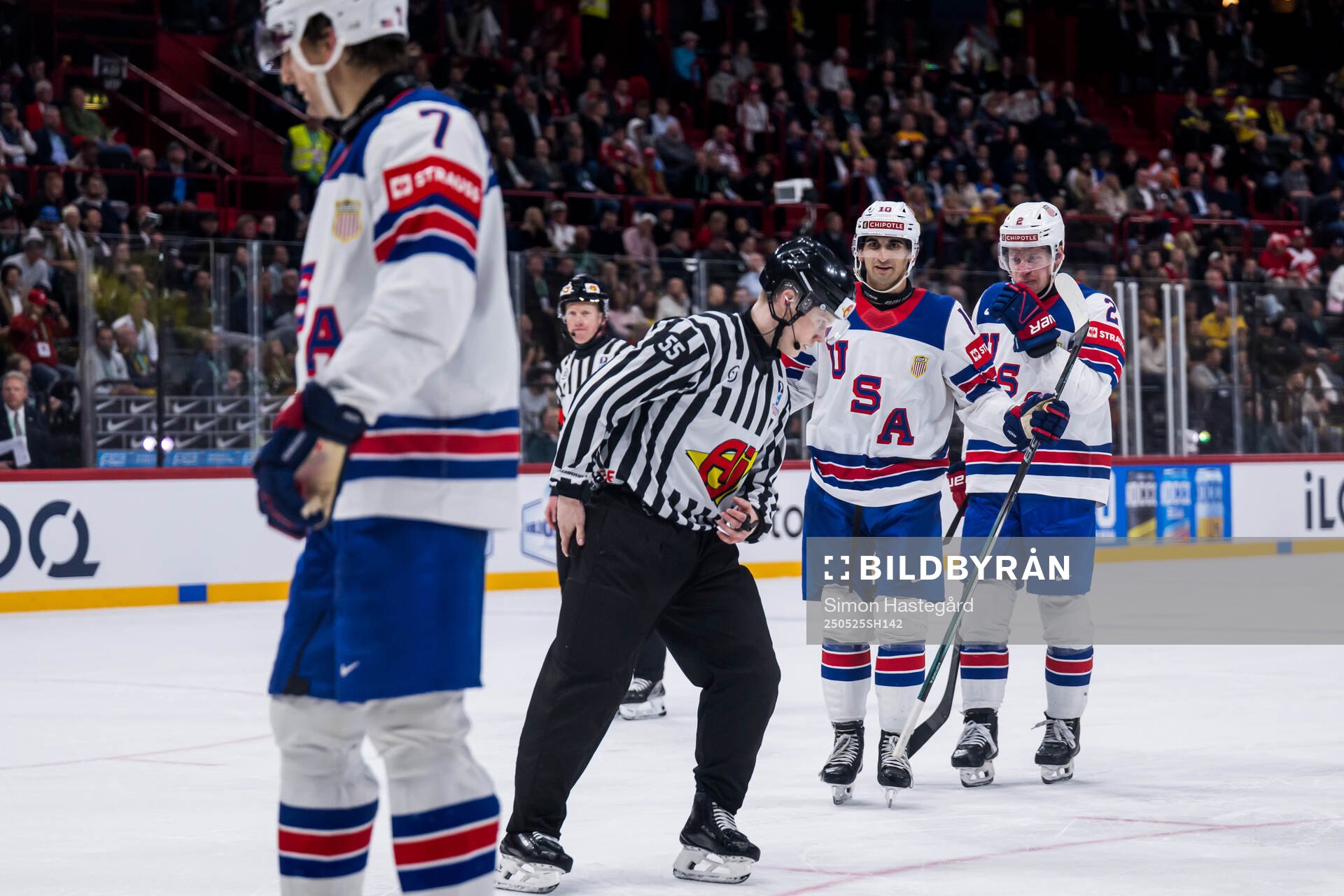 Matty Beniers and Jackson LaCombe of USA react against