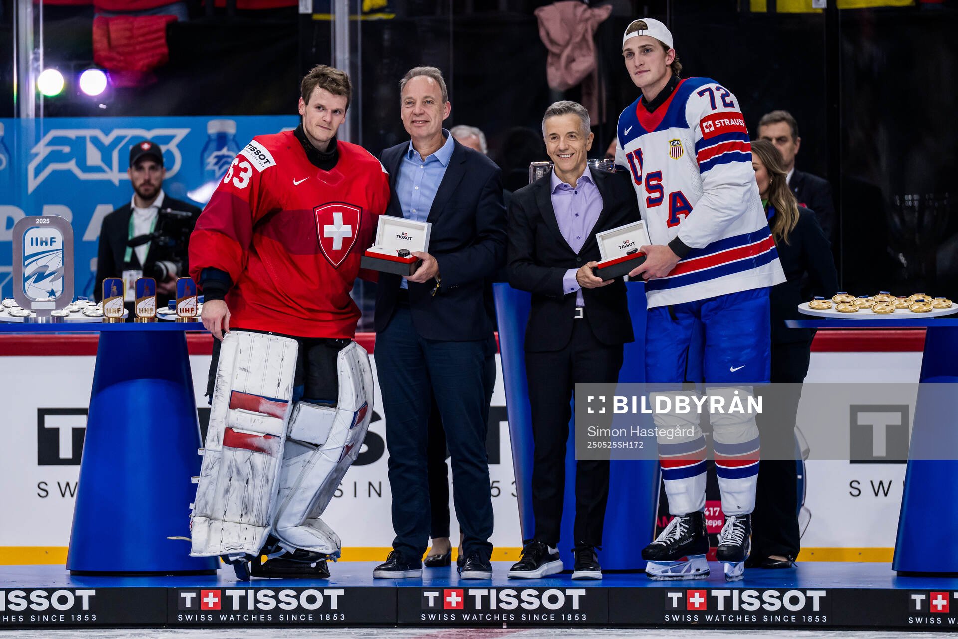 goaltender Leonardo Genoni of Switzerland and Tage Thompson