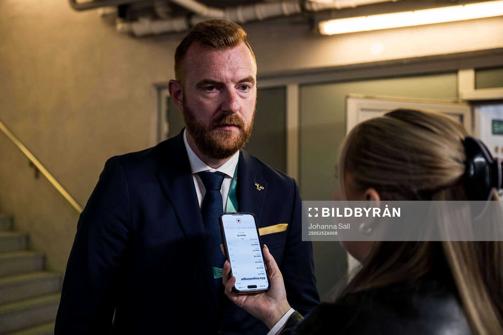 Team manager Anders Lundberg of Sweden is interviewed