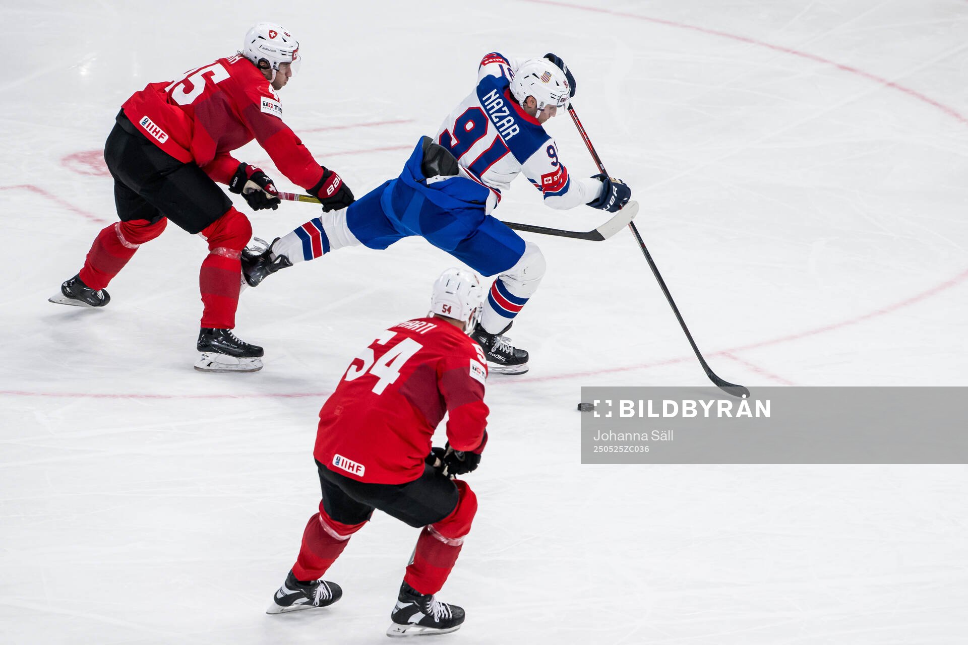 Michael Fora of Switzerland with a hooking against Frank