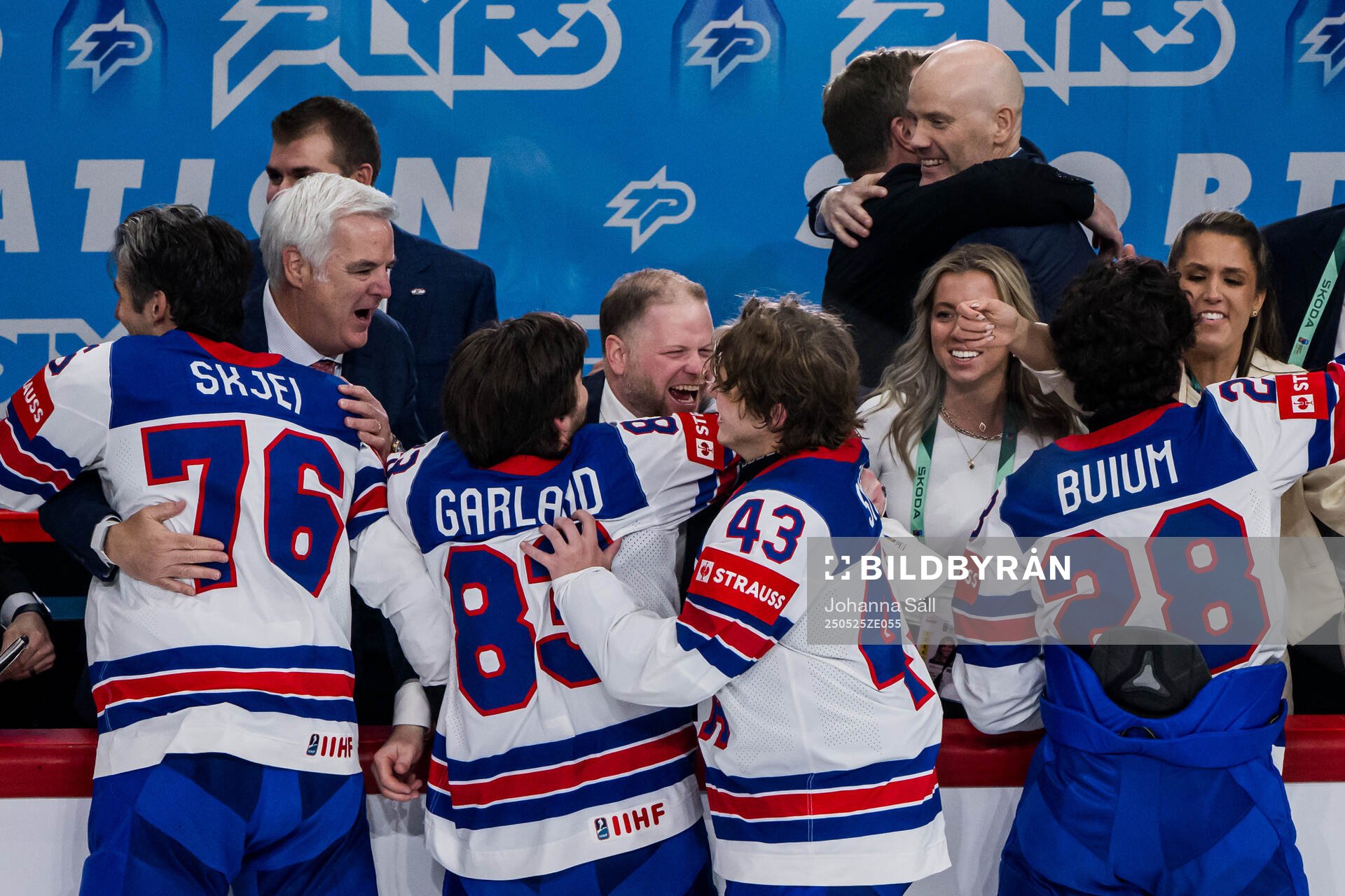 Head coach Ryan Warsofsky of USA celebrates with players