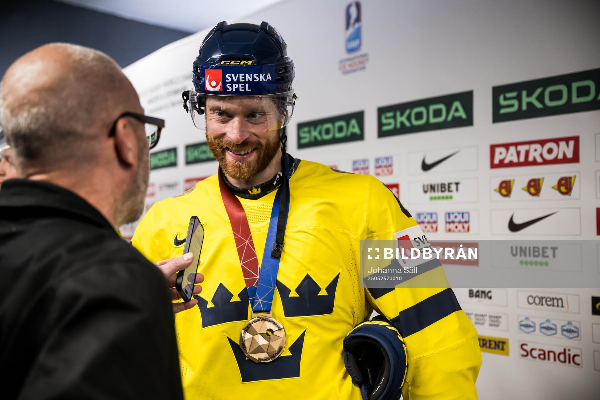 Adam Larsson of Sweden is being interviewed