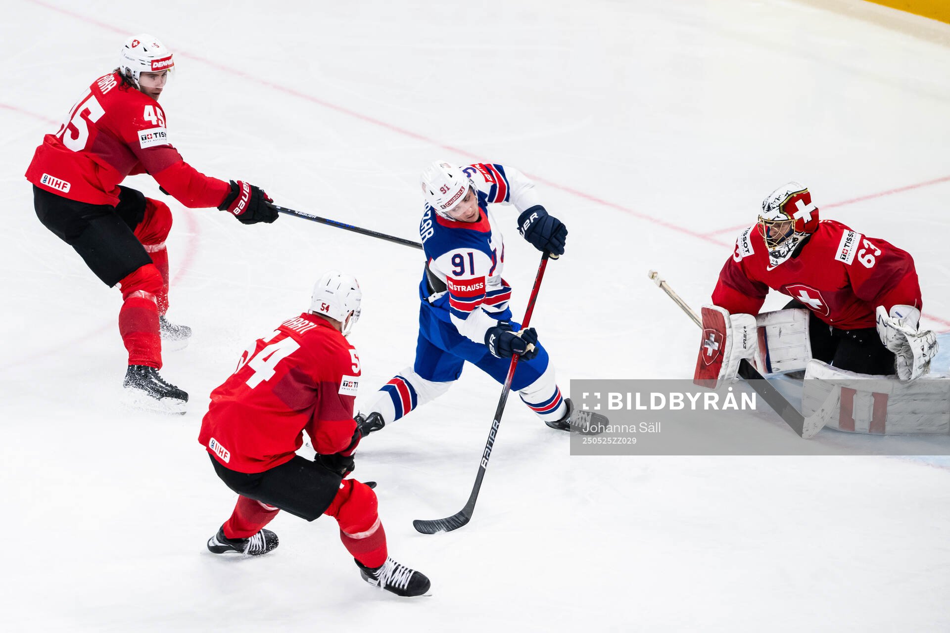 Michael Fora of Switzerland with a hooking against Frank
