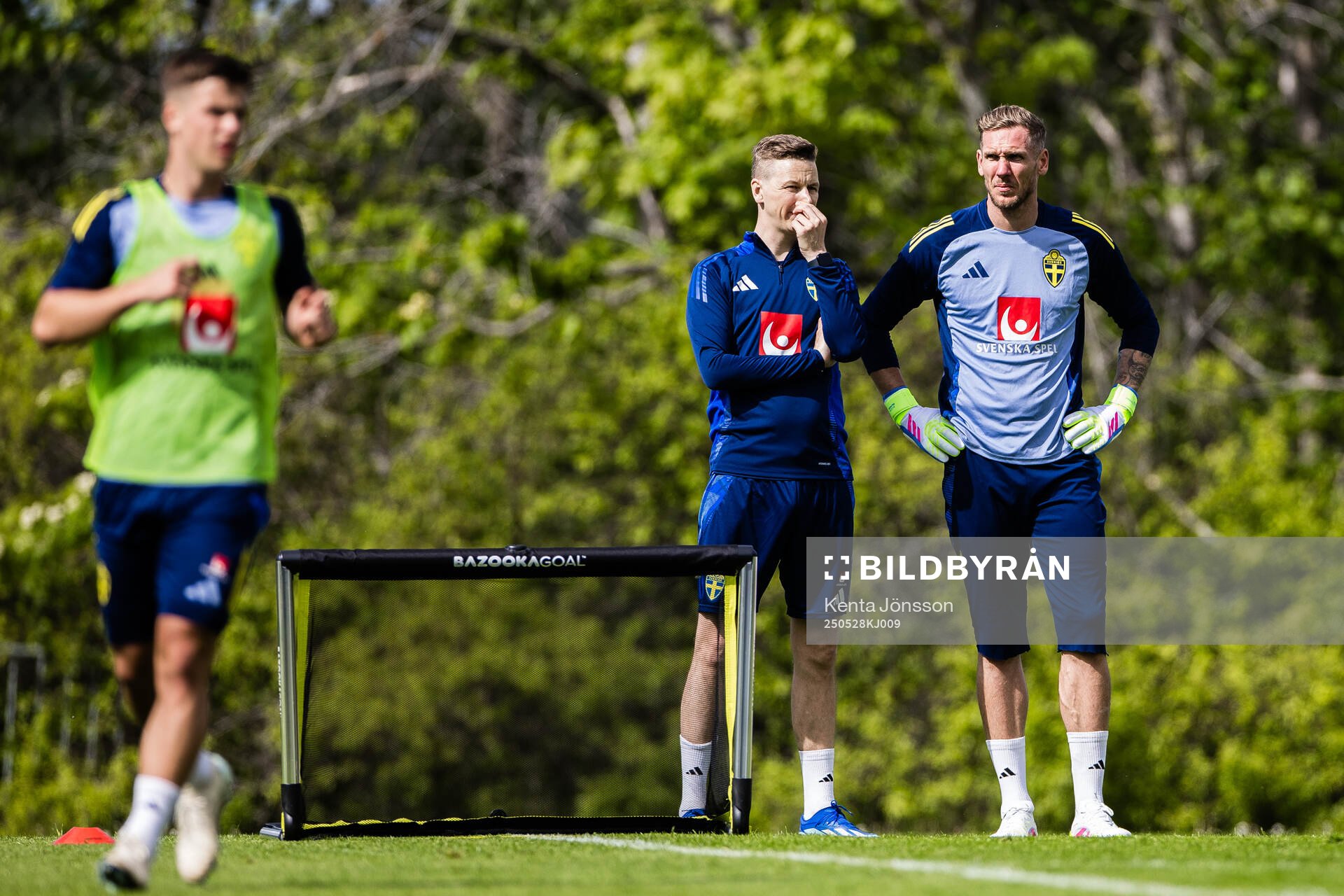 Goalkeeper coach Maths Elfvendal snd goalkeeper Robin Olsen of the Swedish men's national football team during a training session on May 28, 2025 in Stockholm.