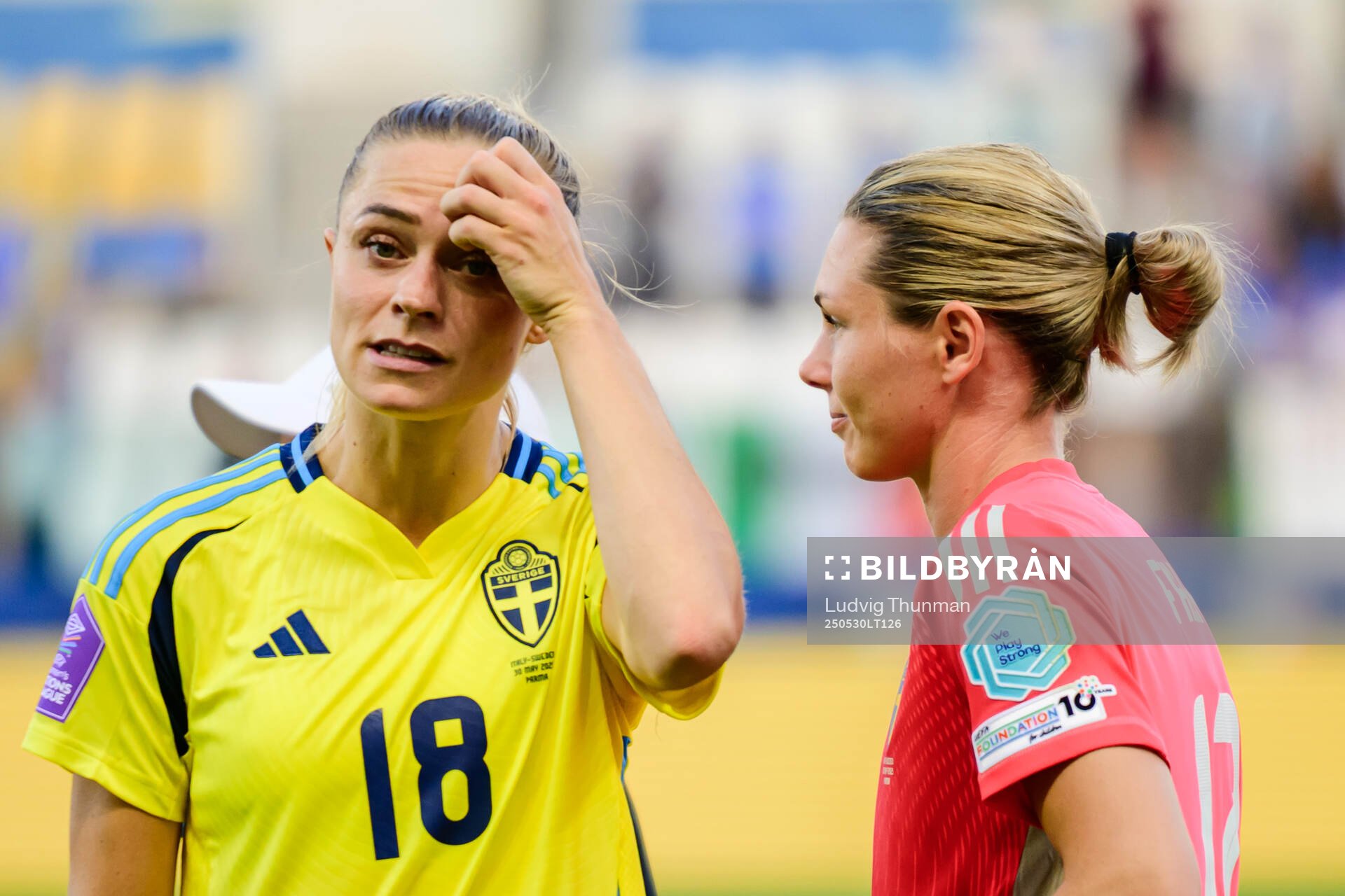 Fridolina Rolfö and goalkeeper Jennifer Falk of Sweden