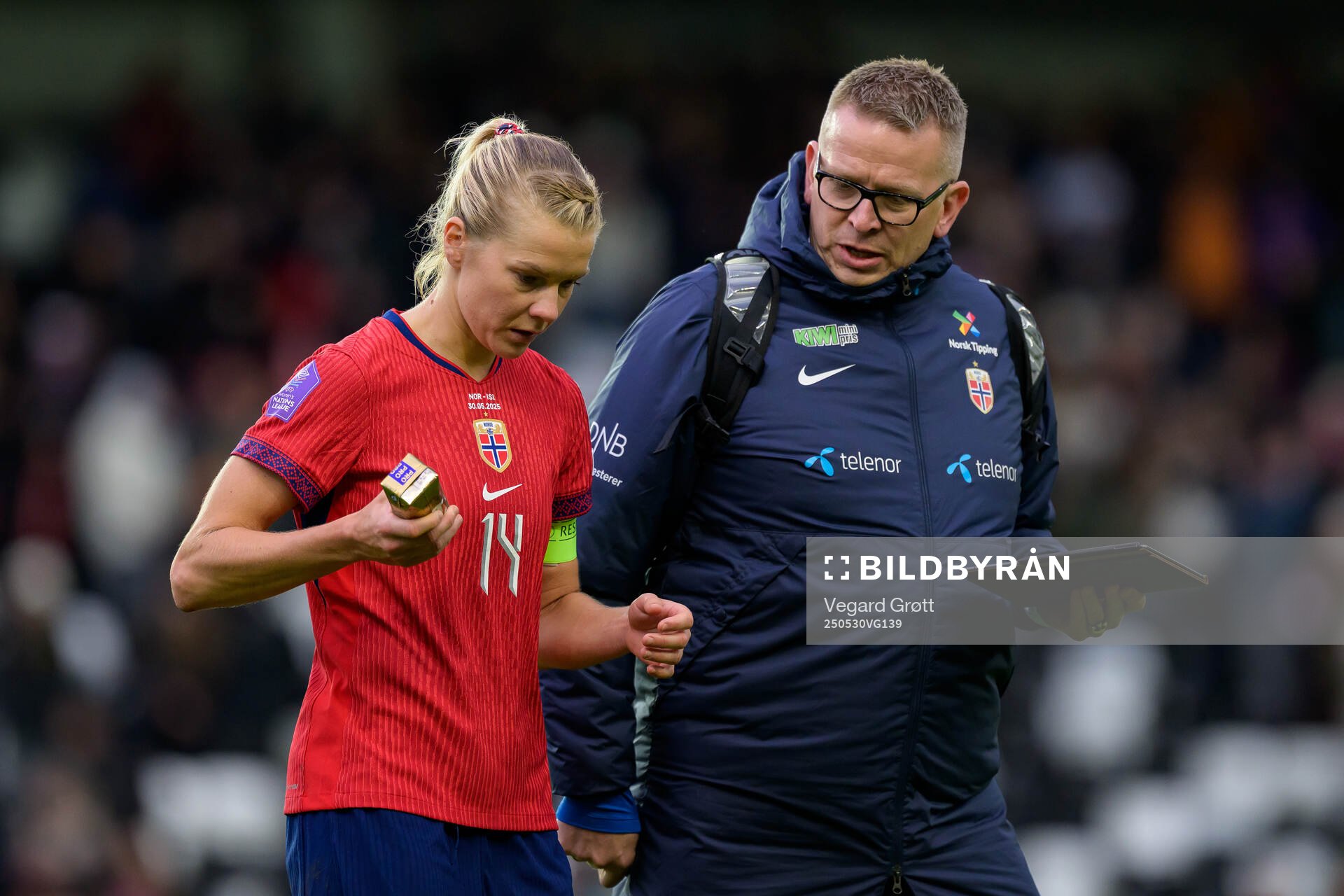 Ada Hegerberg and media officer Henning Sverdrup of Norway