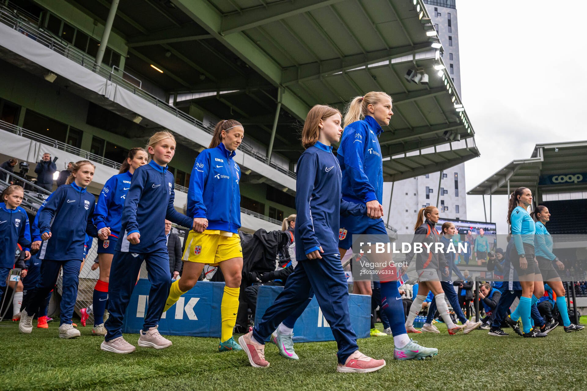 Goalkeeper Cecilie Fiskerstrand and Ada Hegerberg of Norway enter the pitch ahead of the UEFA Women’s Nations League football match between Norway and Iceland on May 30, 2025 in Trondheim.