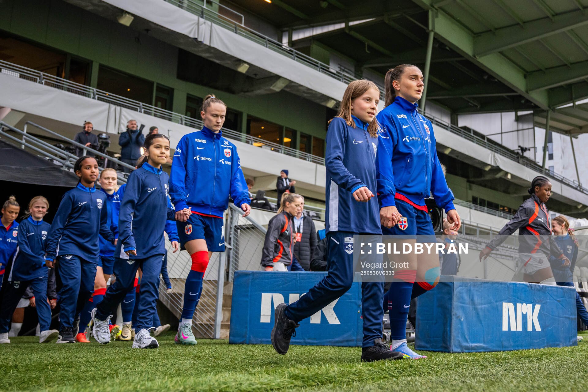 Caroline Graham Hansen and Vilde Bøe Risa of Norway enter the pitch ahead of the UEFA Women’s Nations League football match between Norway and Iceland on May 30, 2025 in Trondheim.