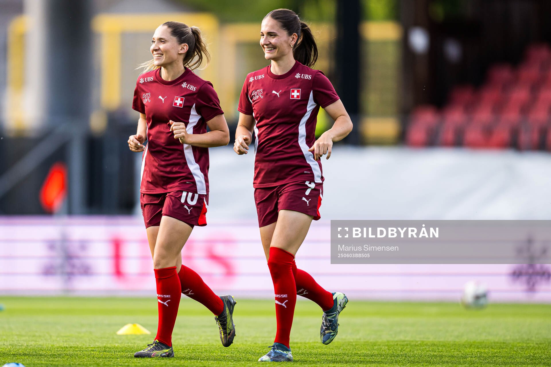 Ramona Bachmann and Naina Inauen of Switzerland warms up
