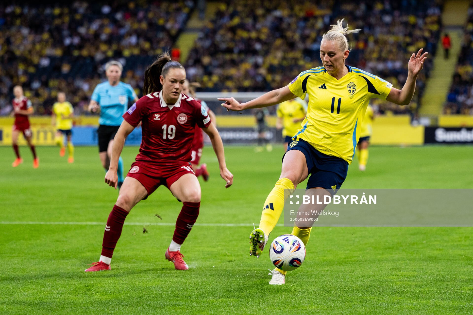 Janni Thomsen of Denmark and Stina Blackstenius of Sweden