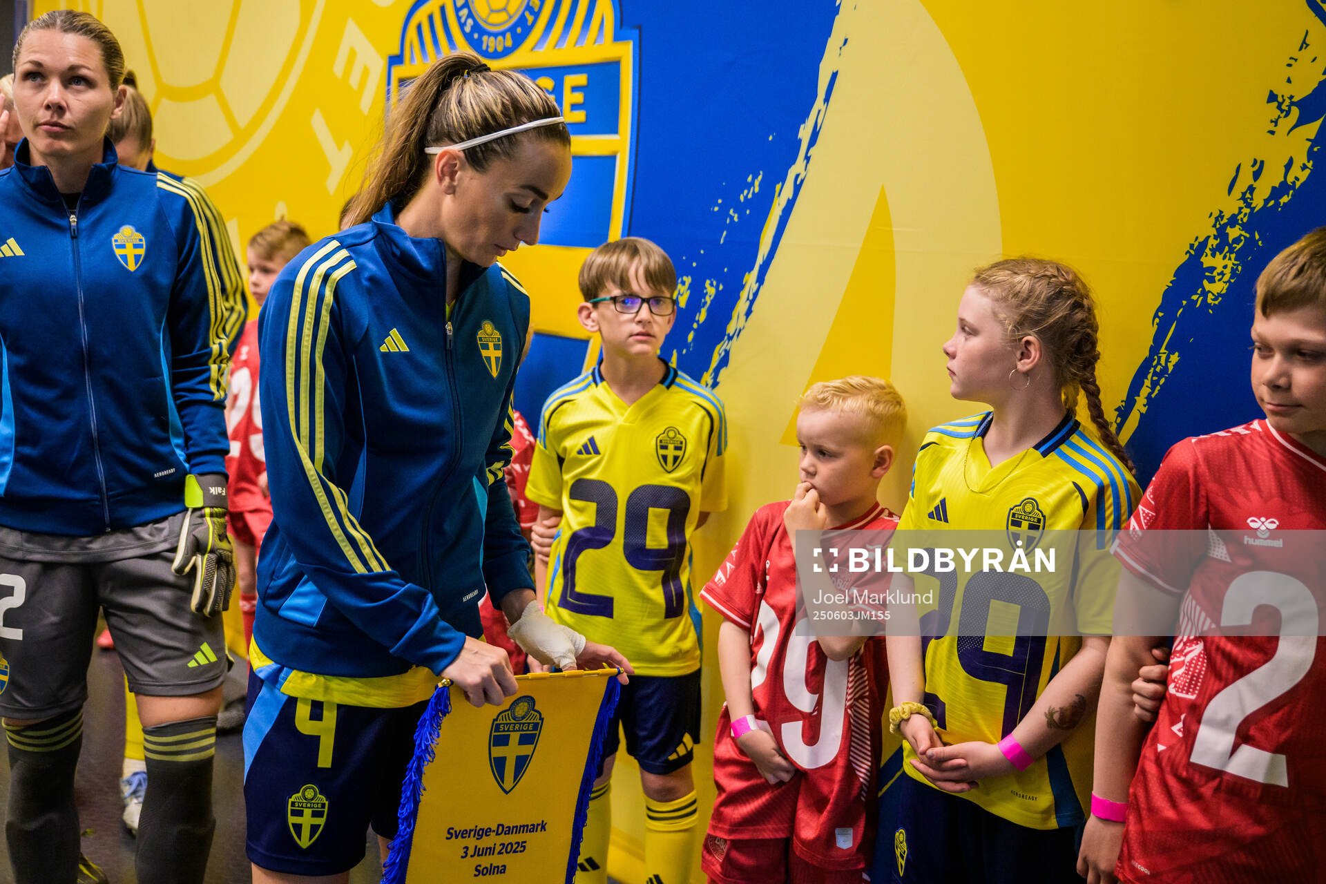 Goalkeeper Jennifer Falk and Kosovare Asllani of Sweden