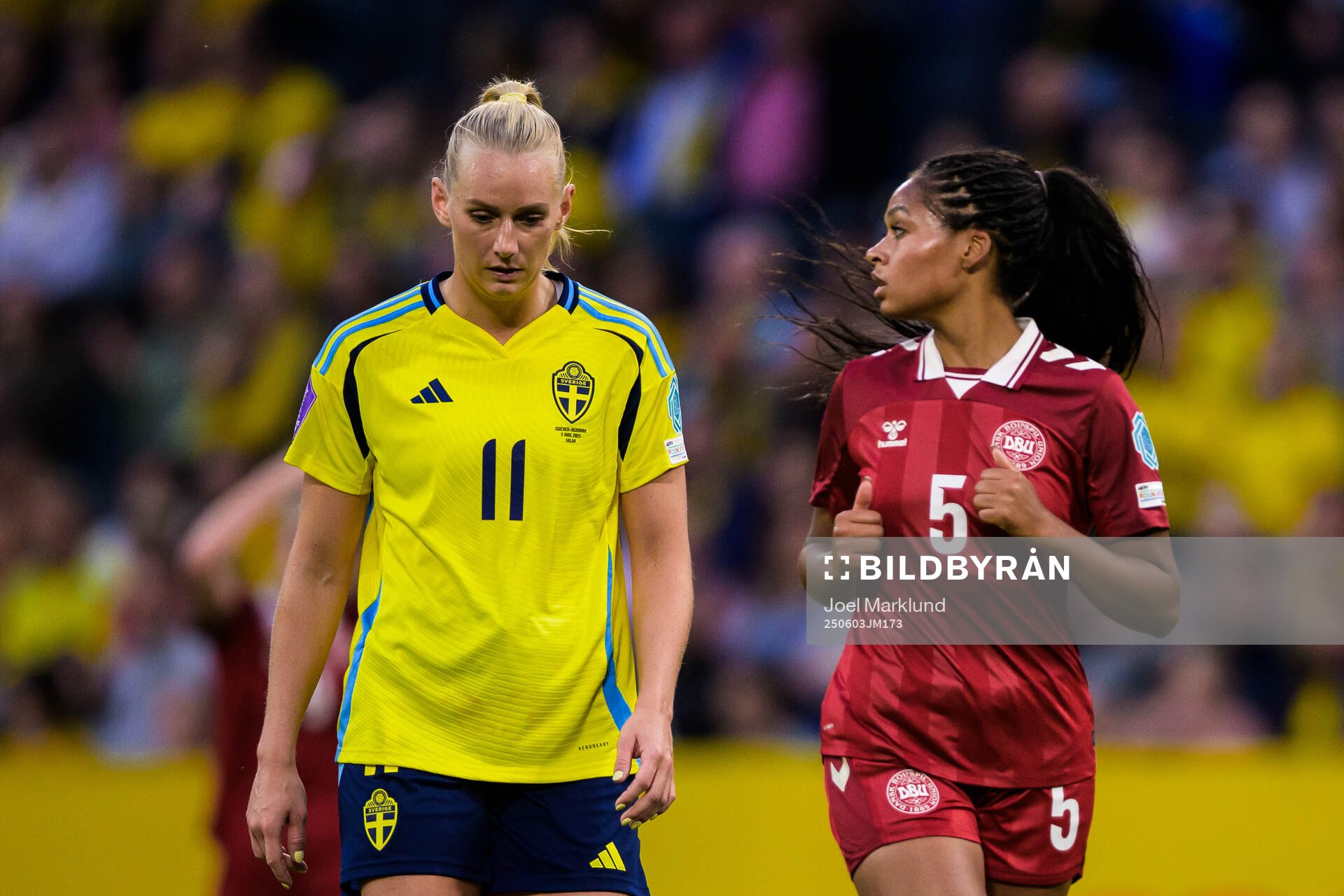Stina Blackstenius of Sweden and Isabella Obaze of Denmark