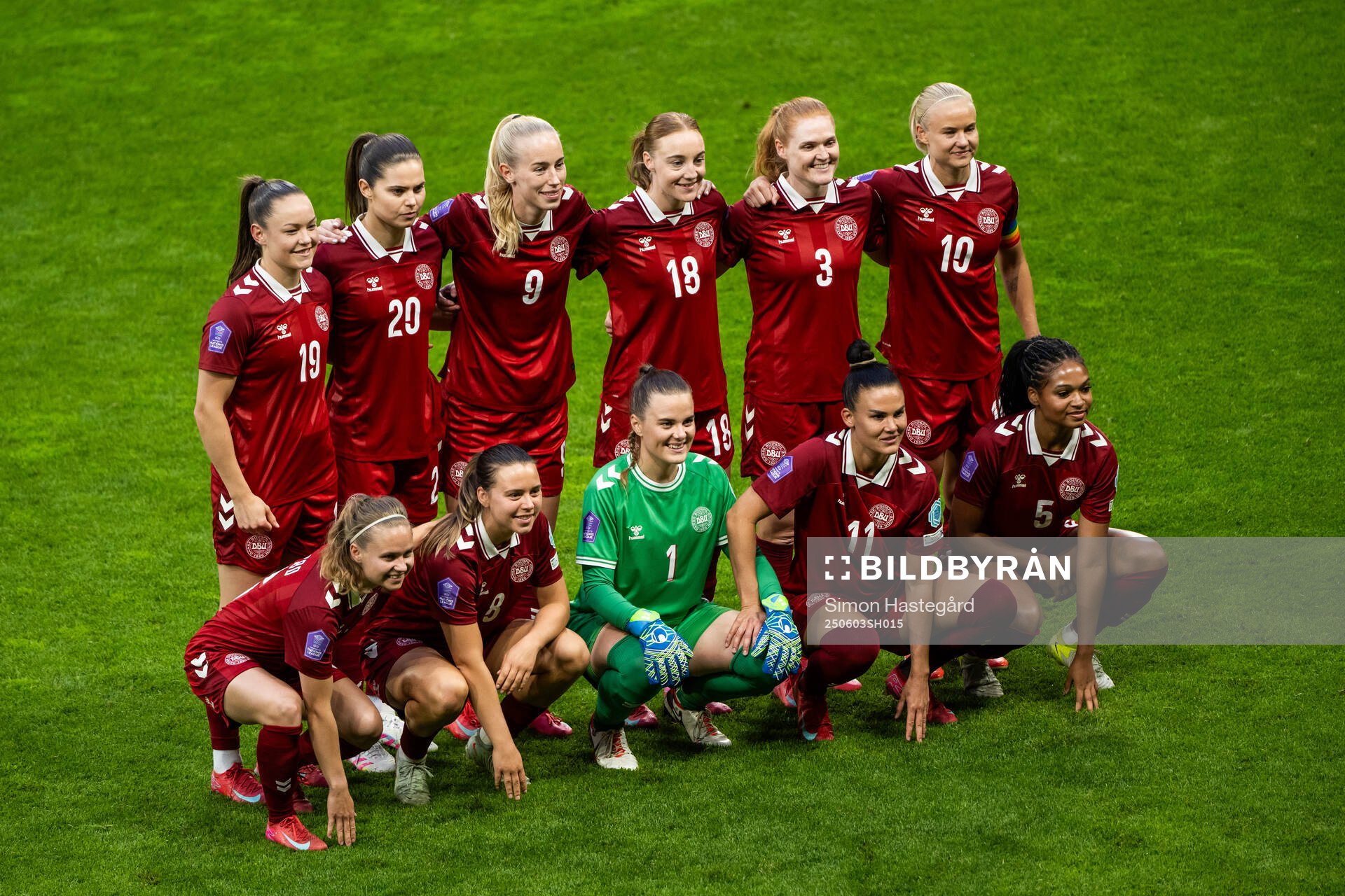 The starting eleven of Denmark pose for a photo