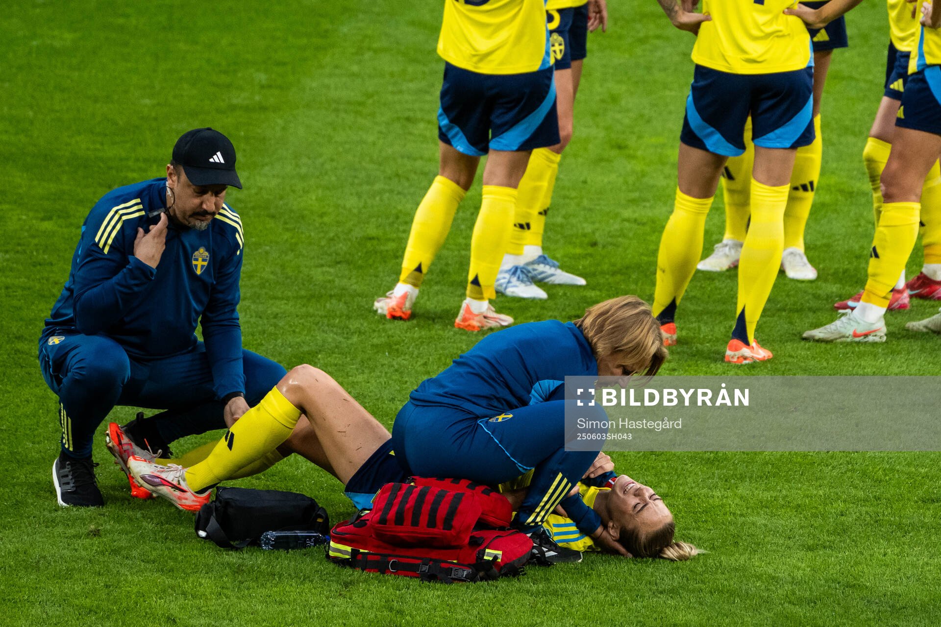Fridolina Rolfö of Sweden receives medical attention