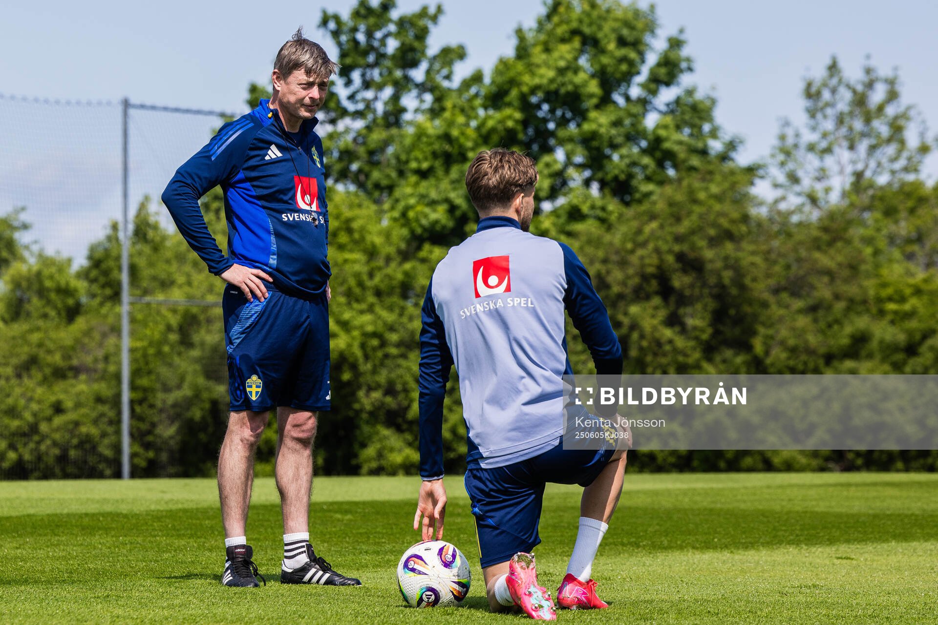 Head coach Jon Dahl Tomasson and Anton Saletros of the