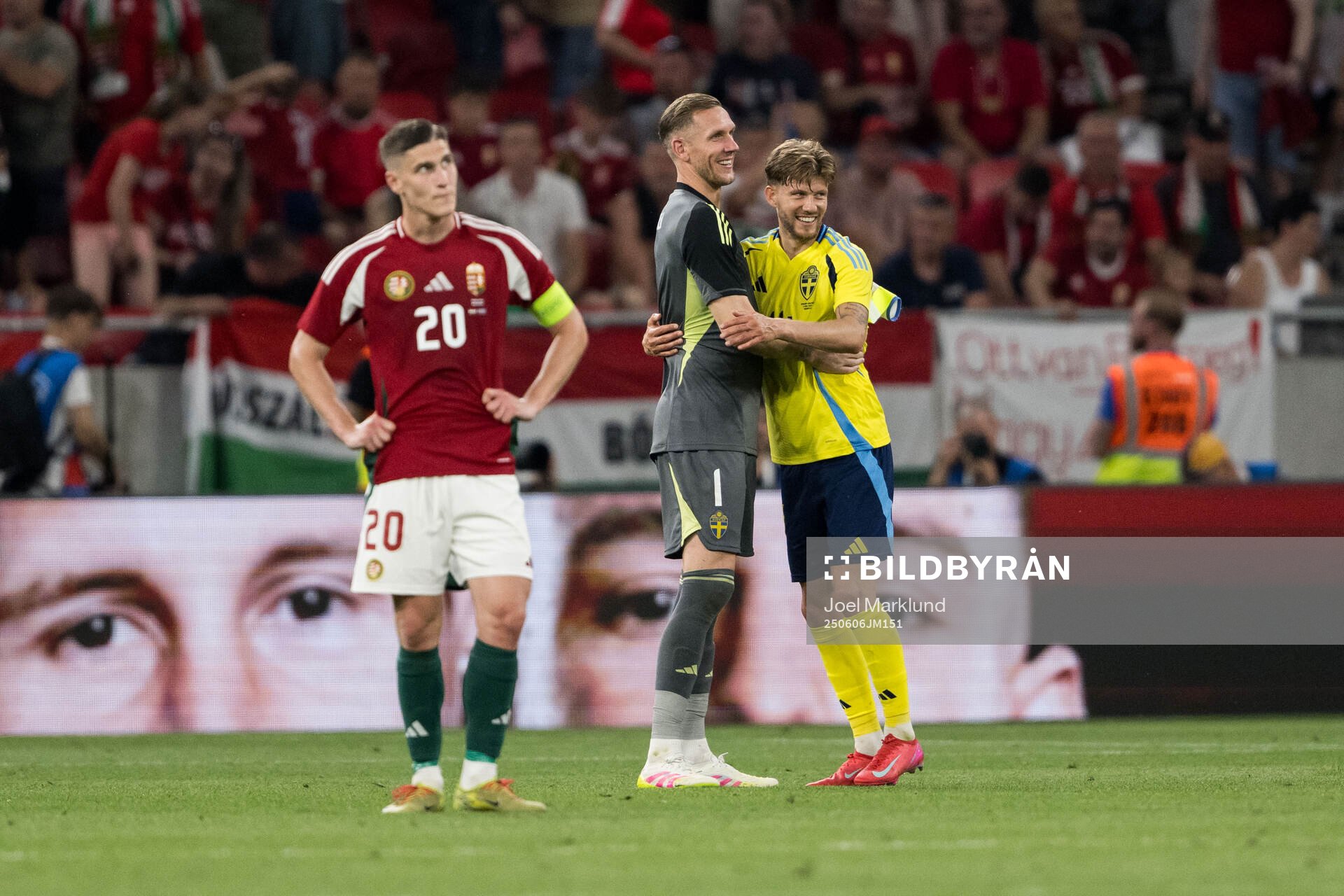 Roland Sallai of Hungary beside goalkeeper Robin Olsen and