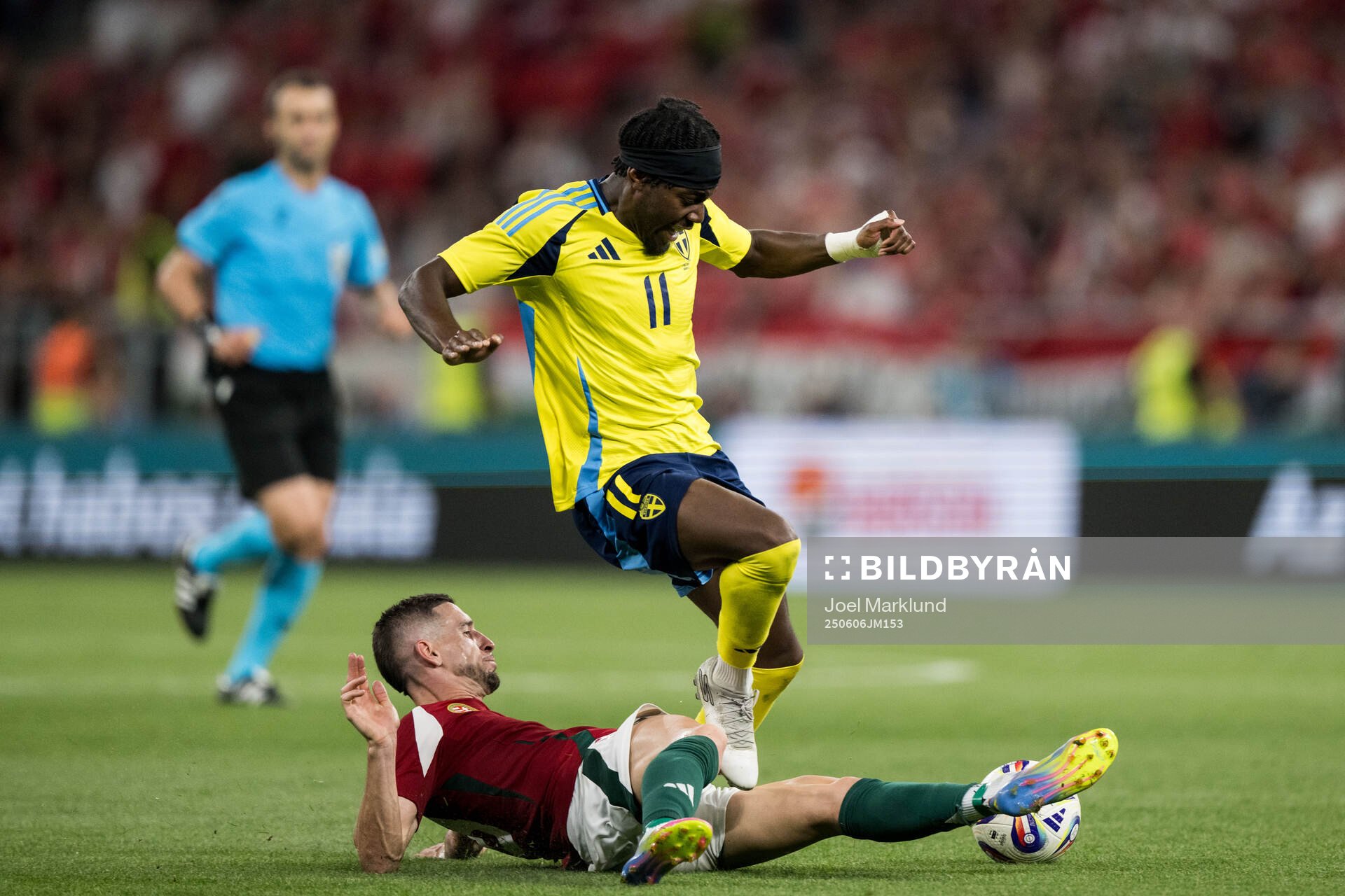 Zsolt Nagy of Hungary and Anthony Elanga of Sweden