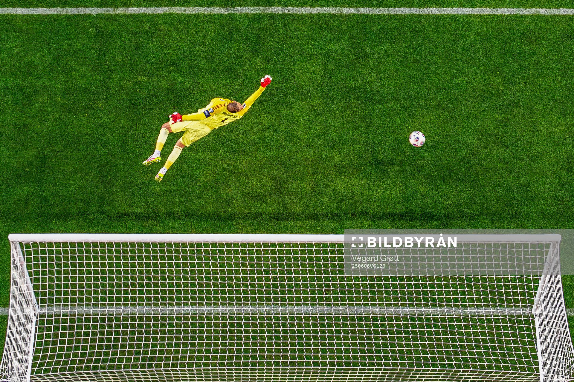 Goalkeeper Gianluigi Donnarumma of Italy as the ball hits