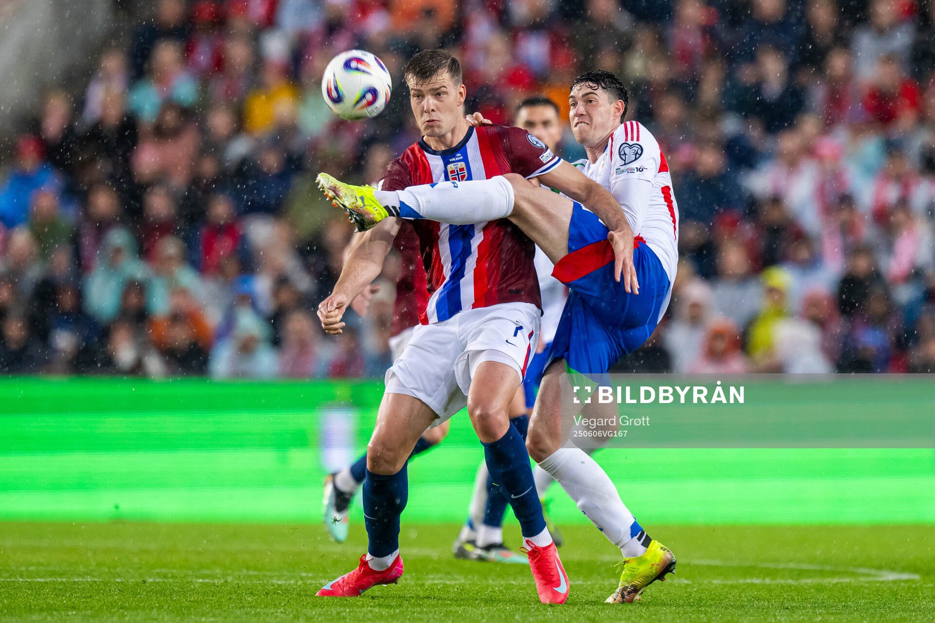 Alexander Sørloth of Norway and Alessandro Bastoni of Italy