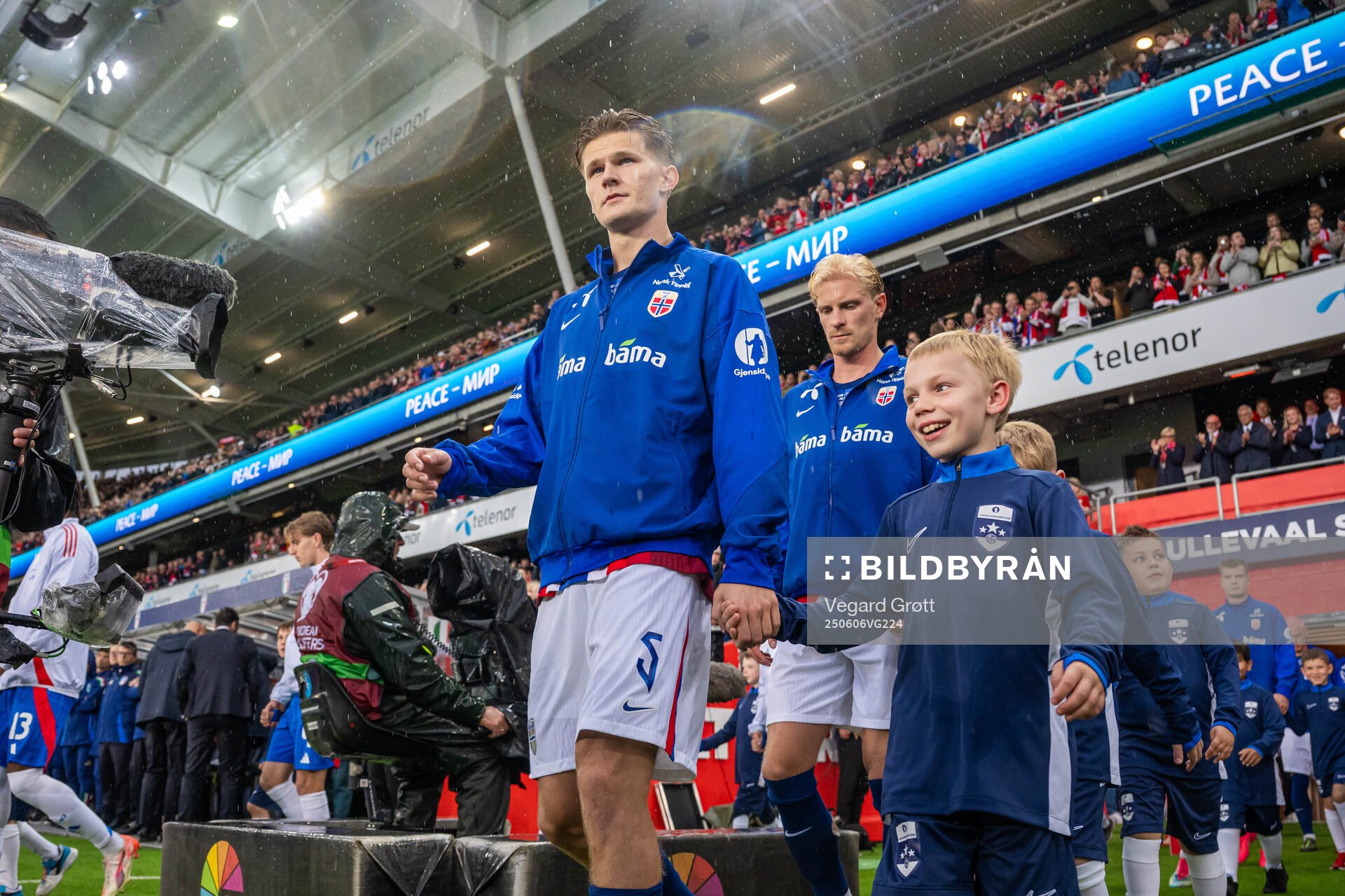 David Møller Wolfe of Norway enters the pitch