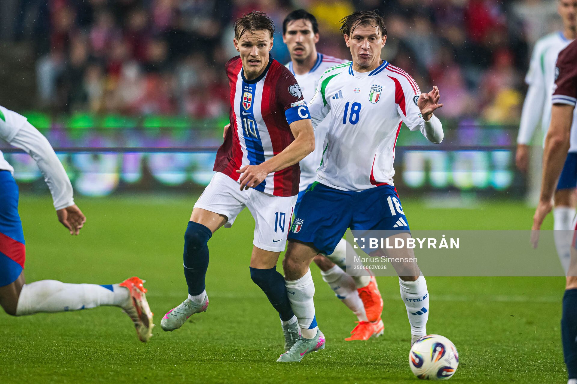 Martin Ødegaard of Norway and Nicolo Barella of Italy