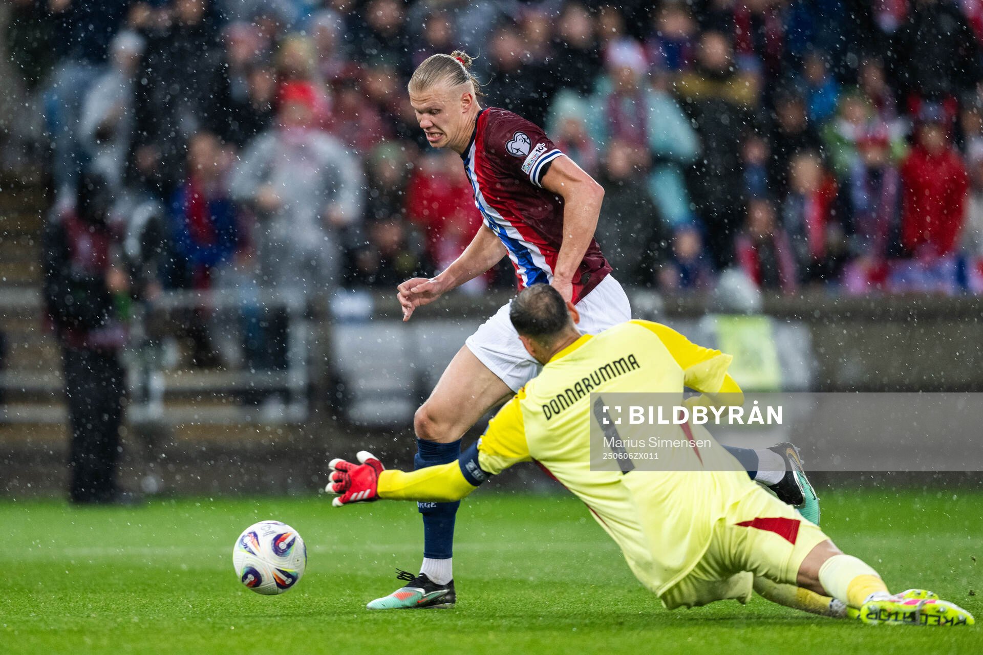 Erling Braut Haaland of Norway scores 3-0 behind goalkeeper