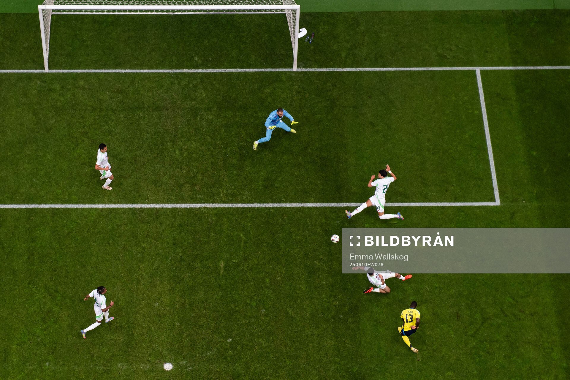 Ken Sema of Sweden scores 1-0 behind goalkeeper Anthony