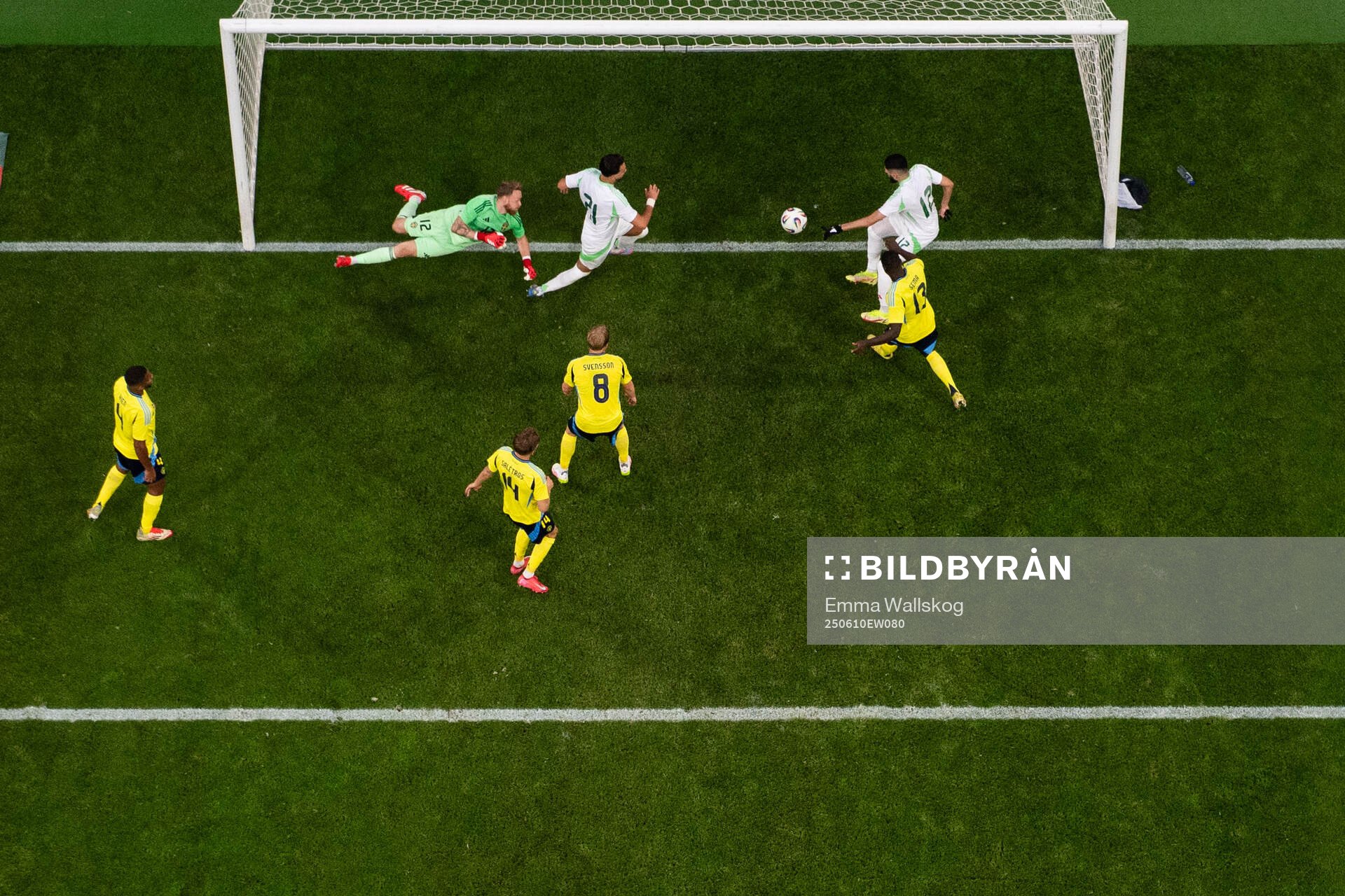 Yassine Benzia of Algeria scores 4-2 behind goalkeeper