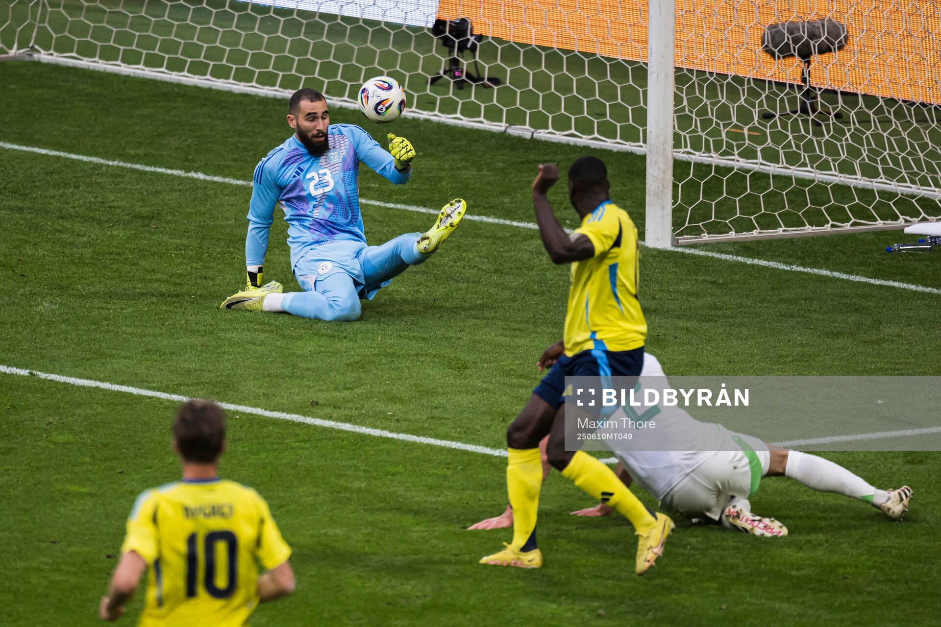 Ken Sema of Sweden scores the 2-0 goal behind goalkeeper