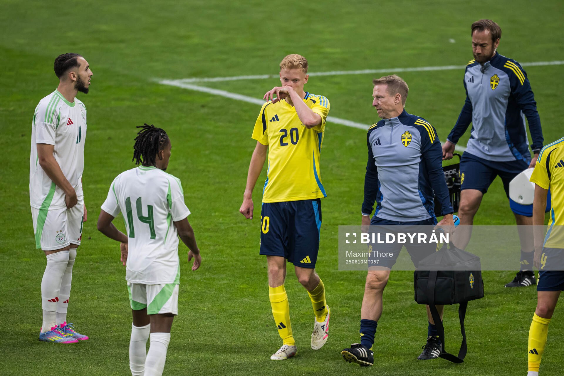 Hugo Larsson of Sweden in pain
