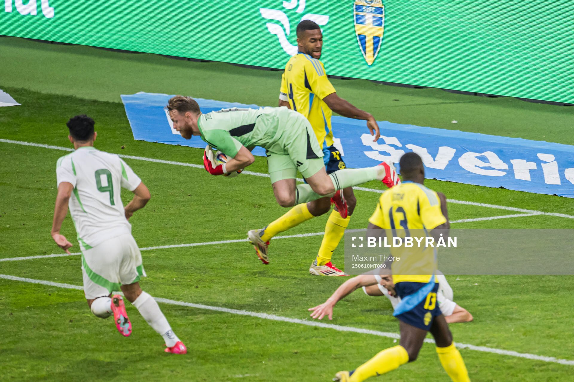 Goalkeeper Viktor Johansson and Isak Hien of Sweden