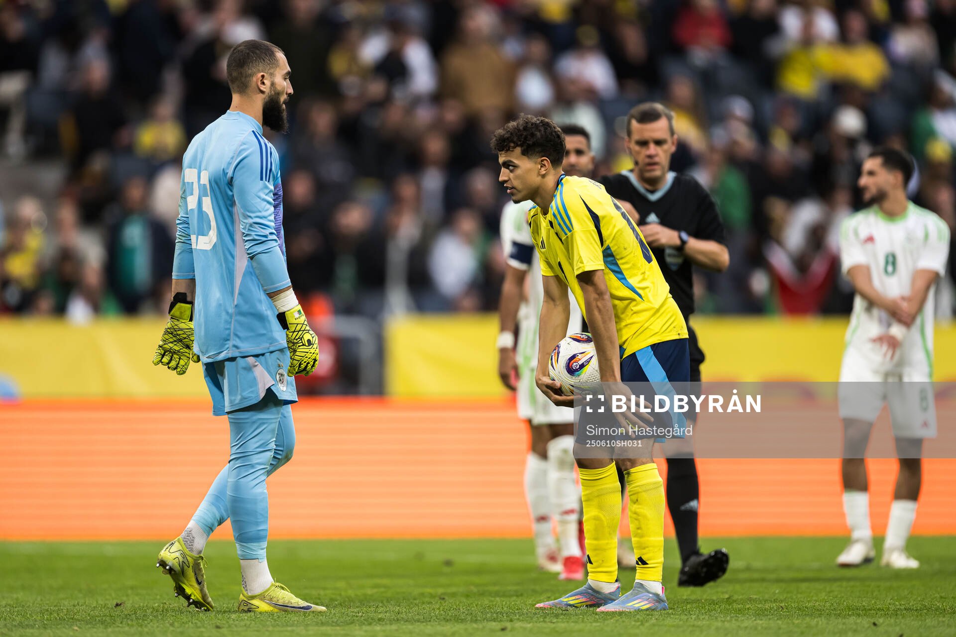 Goalkeeper Anthony Mandrea of Algeria and Yasin Ayari of