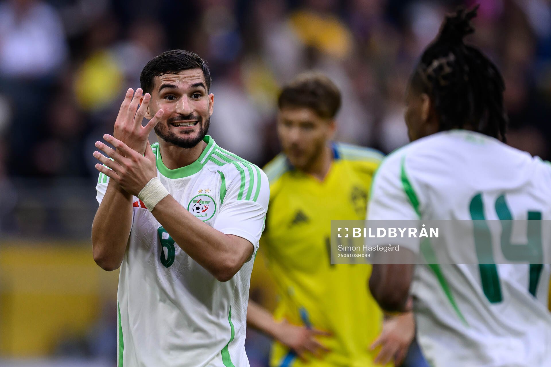 Houssem Aouar of Algeria reacts