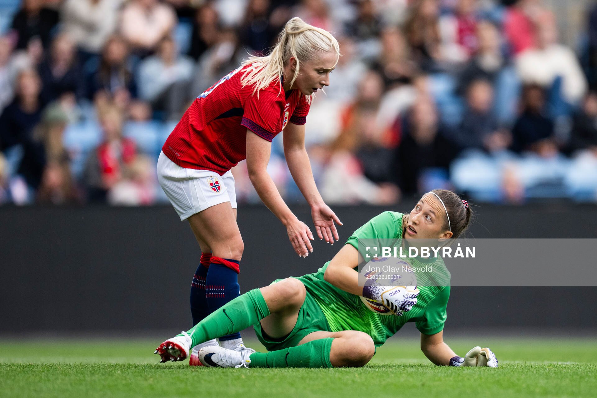 Thea Bjelde and goalkeeper Cecilie Fiskerstrand of Norway