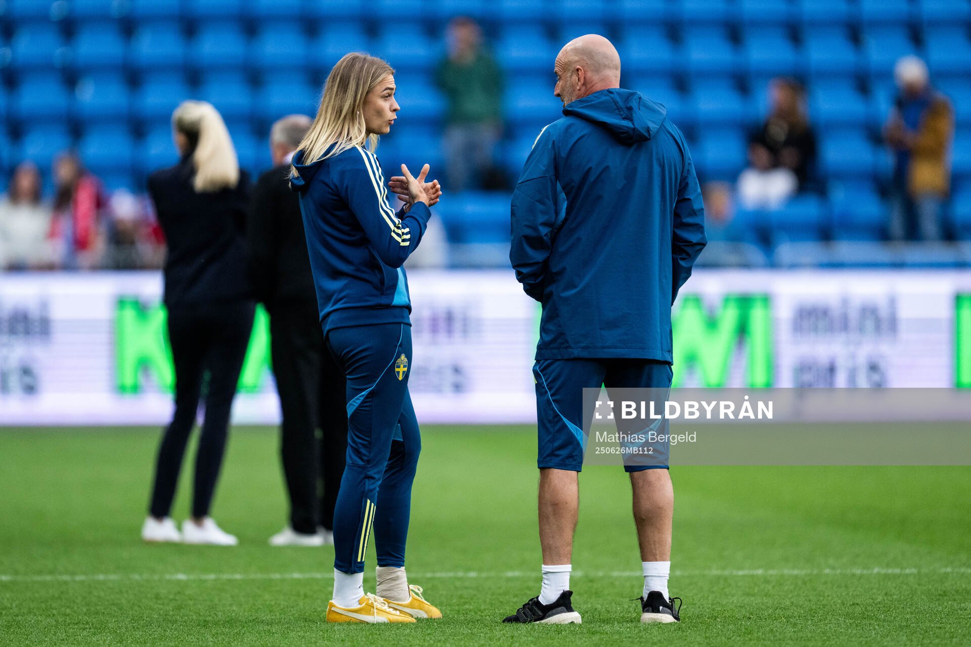 Fridolina Rolfö and assistant coach Magnus Wikman of Sweden