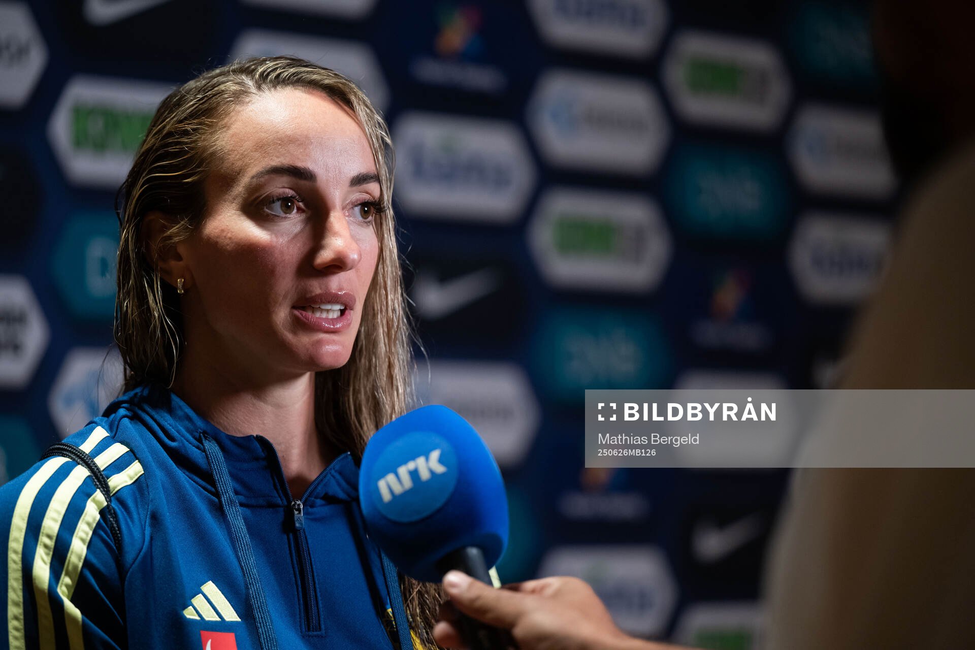 Kosovare Asllani of Sweden in mixed zone
