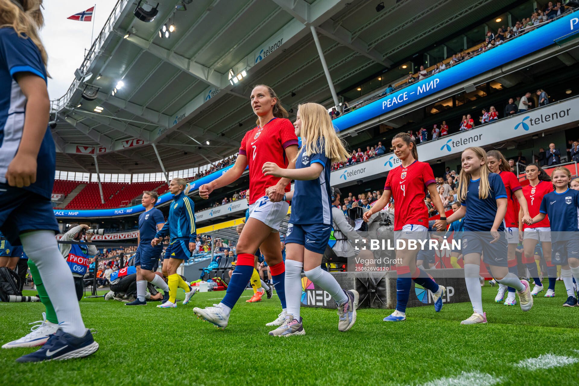 Marit Bratberg Lund of Norway enters the pitch