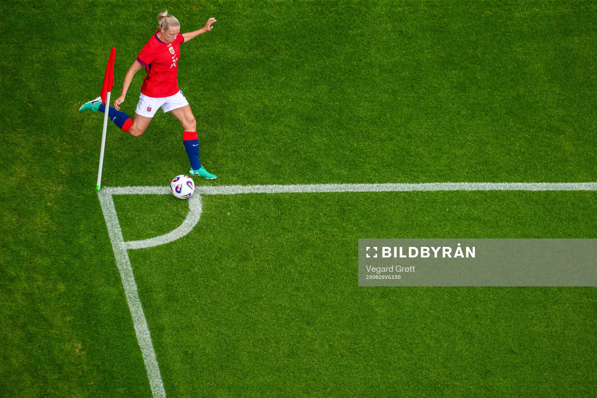 Lisa Naalsund of Norway takes a corner kick