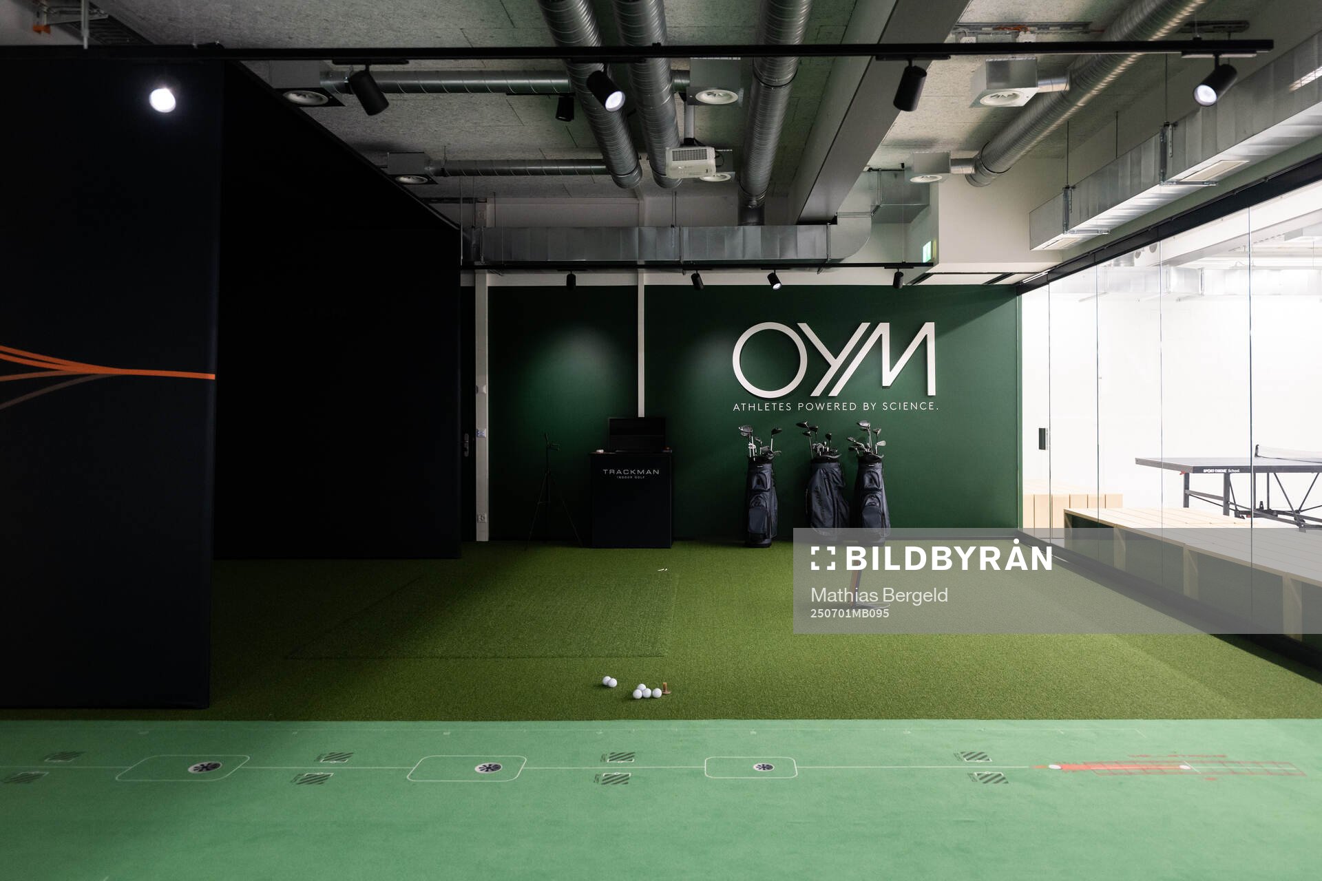 A golf simulator seen at a walk around at OYM the base camp