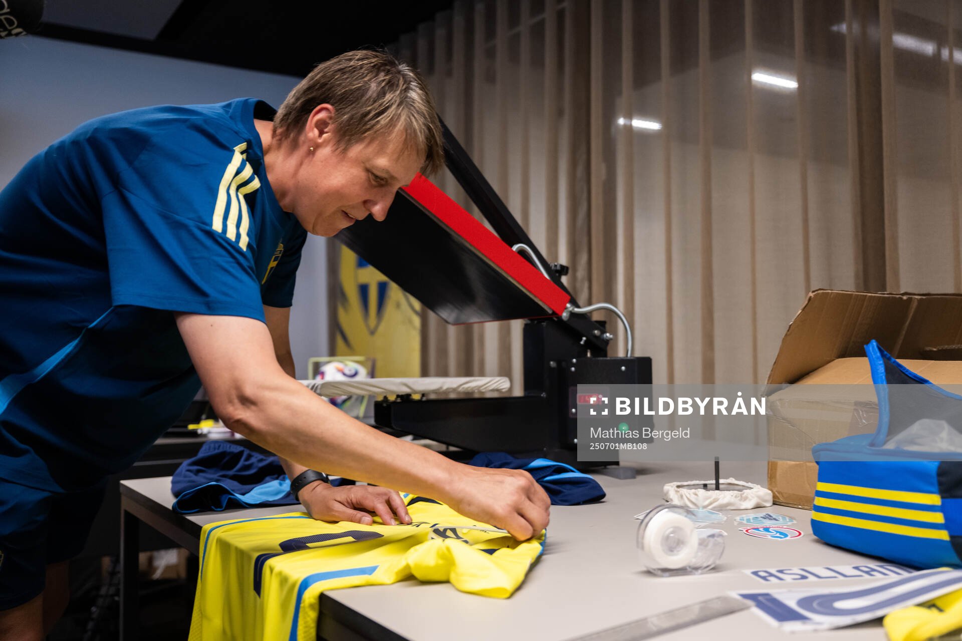 Equipment manager Jessica Karlsson prints Kosovare