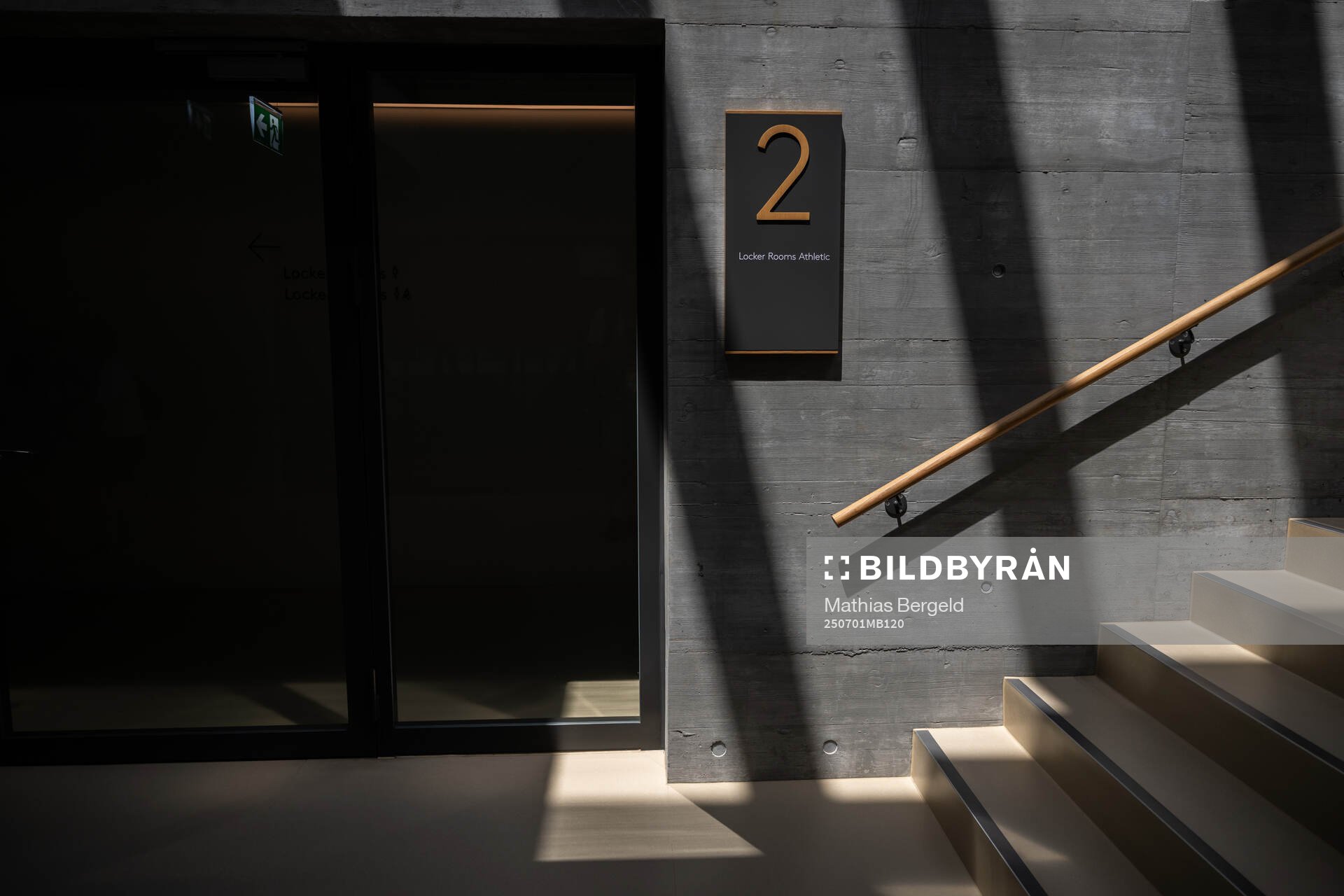 A sign for locker rooms is seen at a walk around at OYM the